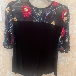 Black lightweight knit shirt with sheer embroidered top. Beautiful top.